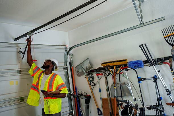 Professional Garage Door Panel Replacement technician working in Lewiston, MN